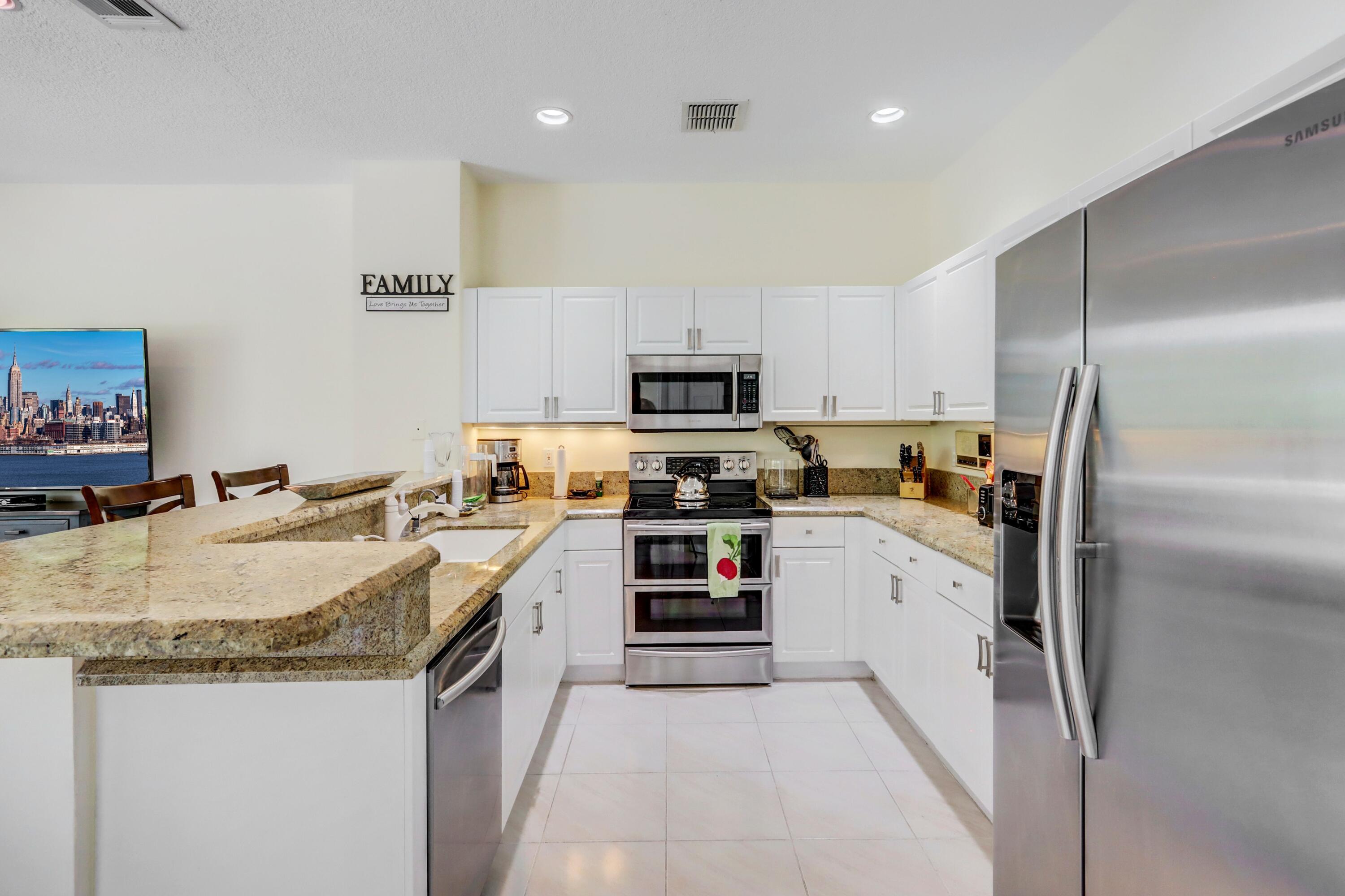 4075 Northwest 58th Lane Boca Raton, FL 33496 - Photo 9 of 24 Kitchen - 3