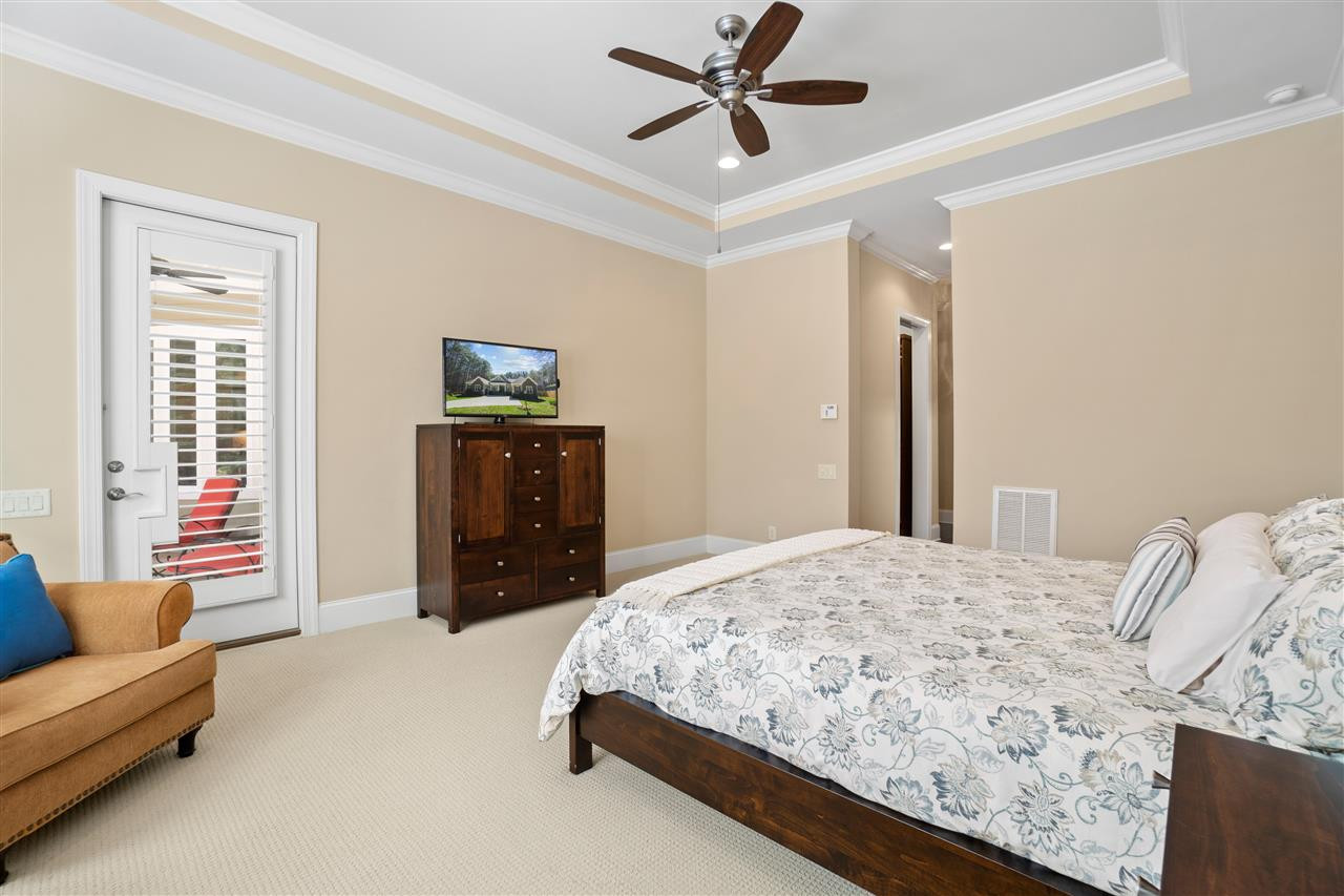 1504 Brassfield Road Raleigh, NC 27614 - Photo 14 of 30 Master Bedroom Opens to the Screened Lanai