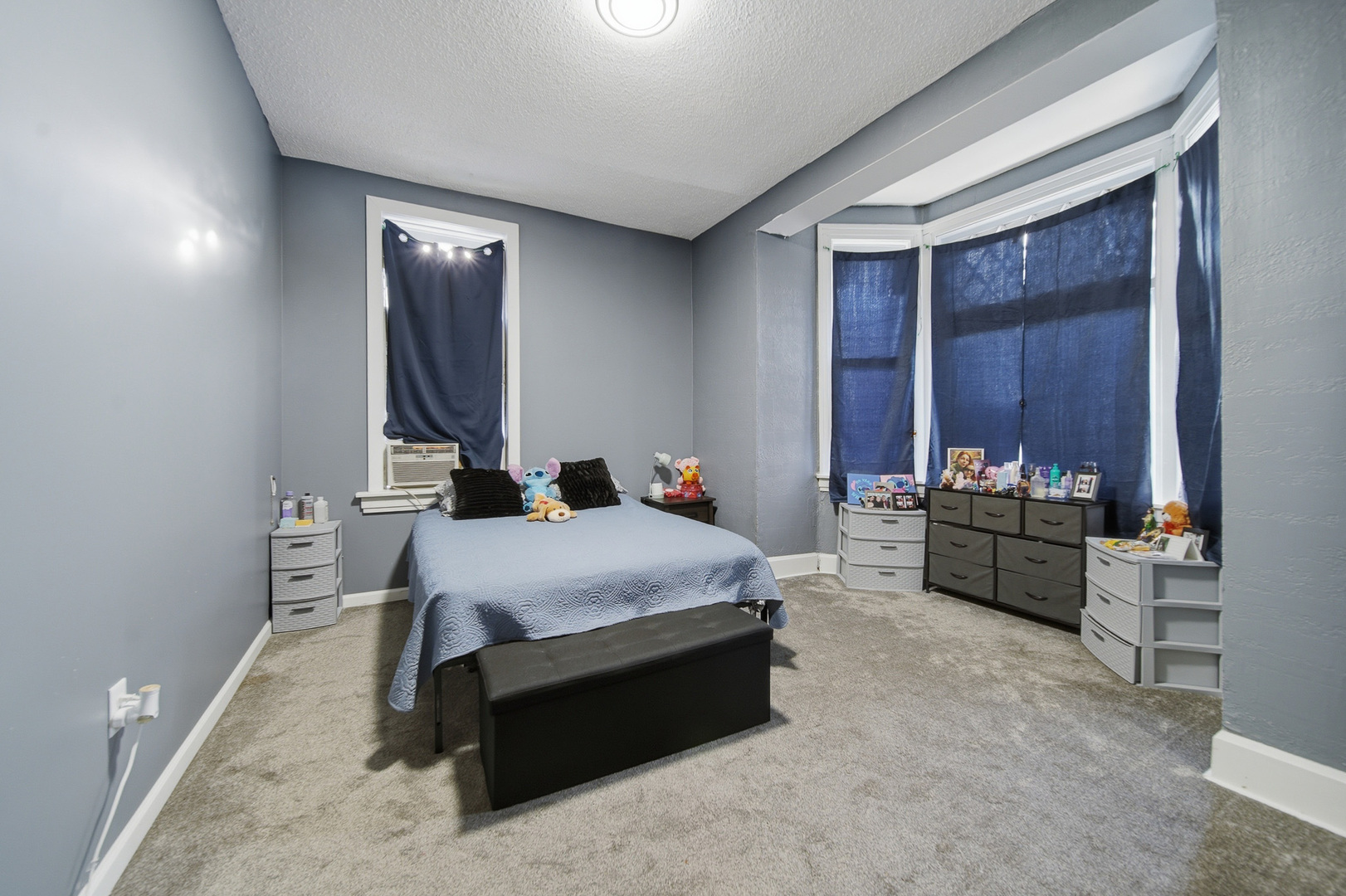 305 Monroe Avenue Dixon, IL 61021 - Photo 24 of 36 a bed room with a bed and a chair