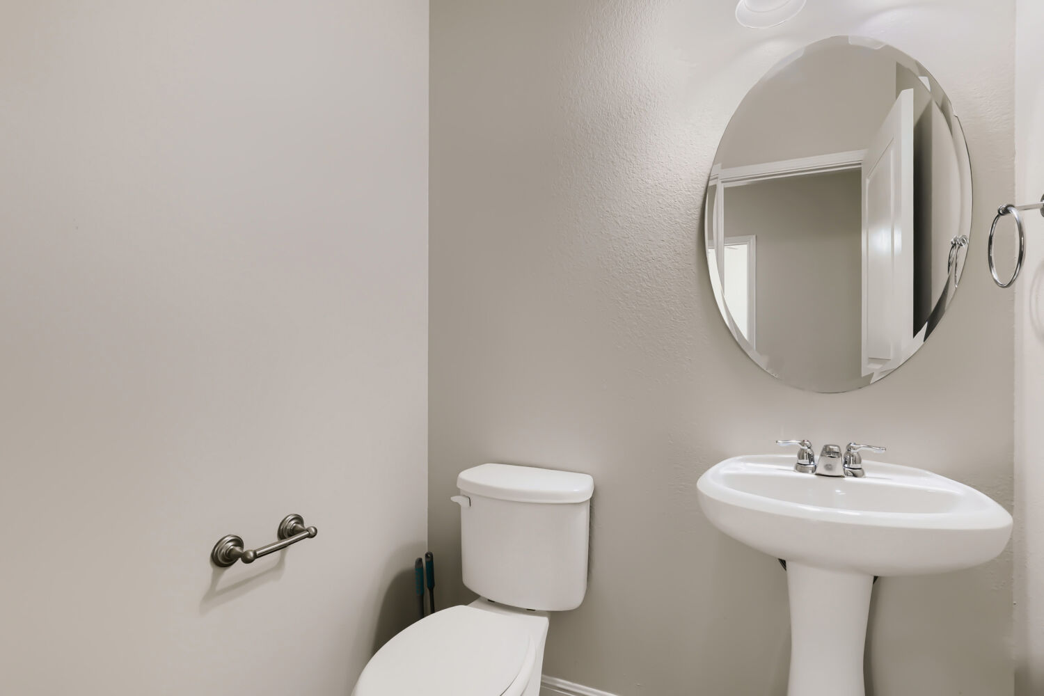 5136 Hellman Kyle, TX 78640 - Photo 14 of 25 a bathroom with a toilet sink and mirror
