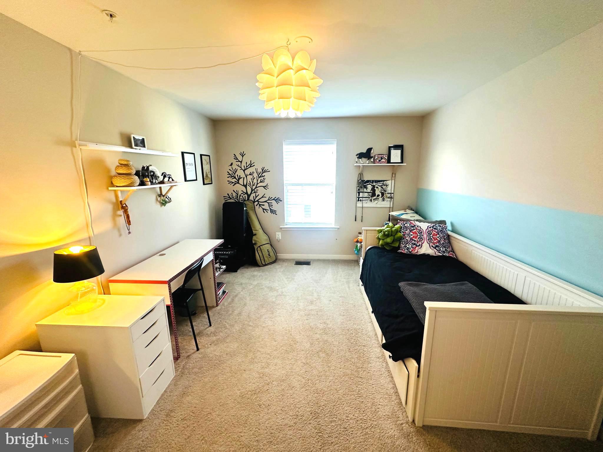 25576 Tolar Square Chantilly, VA 20152 - Photo 18 of 36 a room with furniture and a window