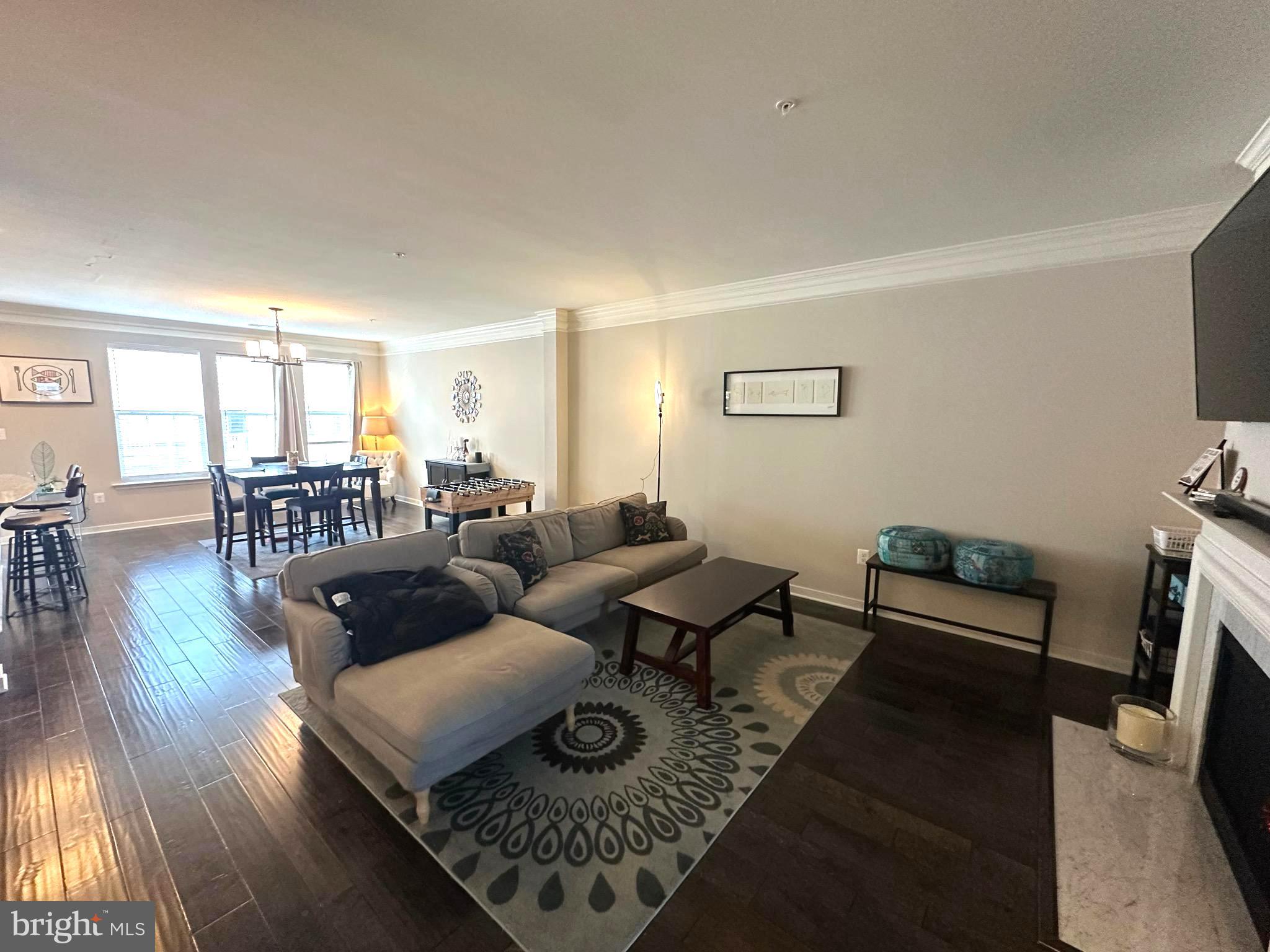 25576 Tolar Square Chantilly, VA 20152 - Photo 8 of 36 a living room with furniture and a table