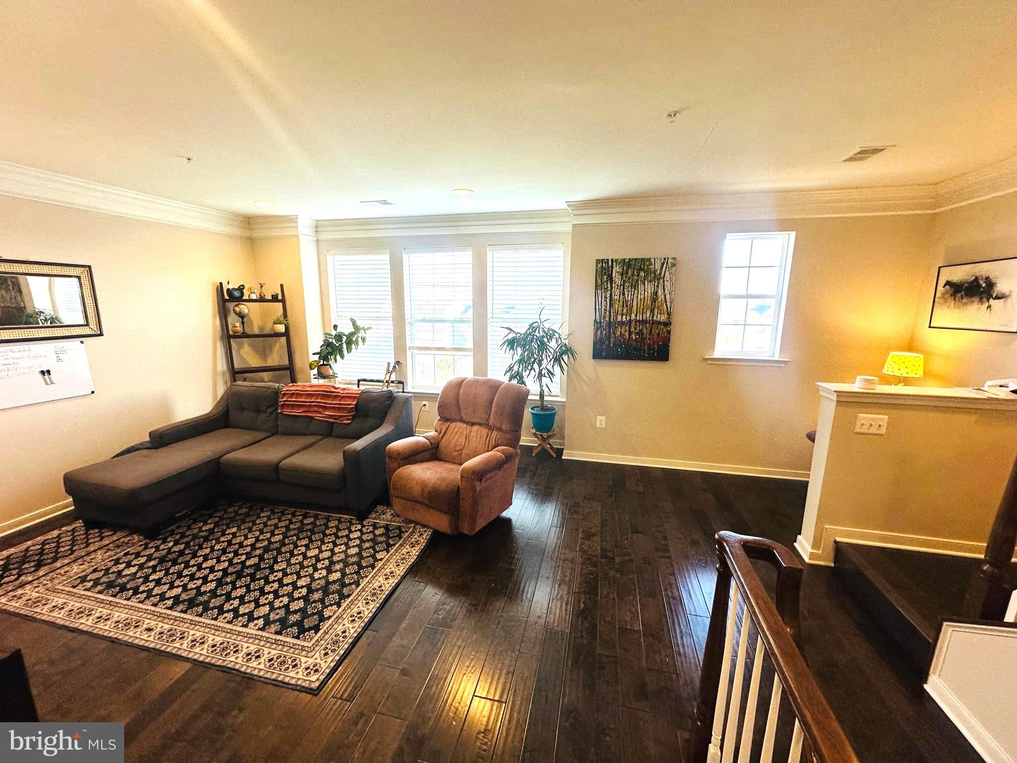 25576 Tolar Square Chantilly, VA 20152 - Photo 10 of 36 a living room with furniture and a window