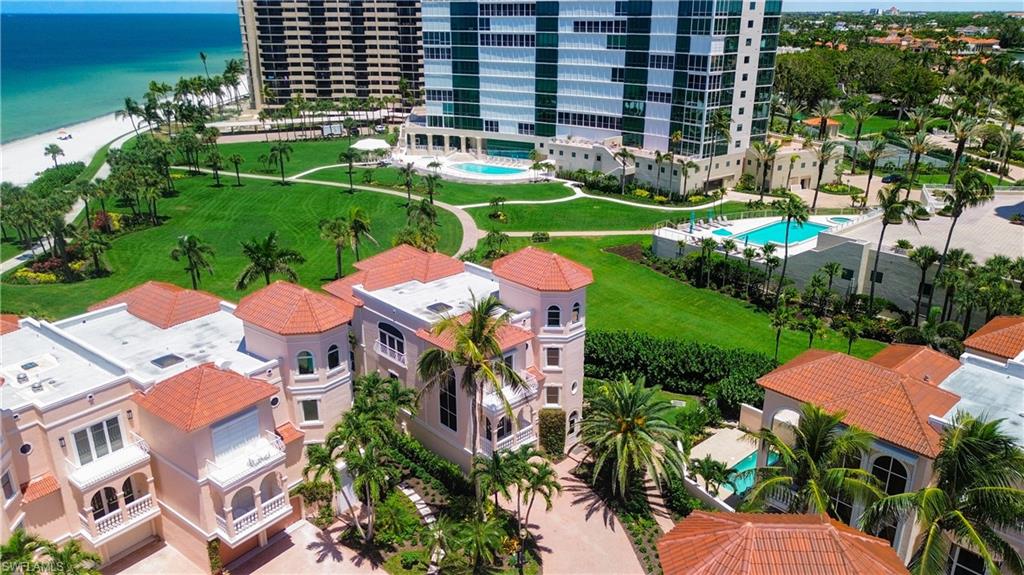 aerial view of a house with a garden and plants