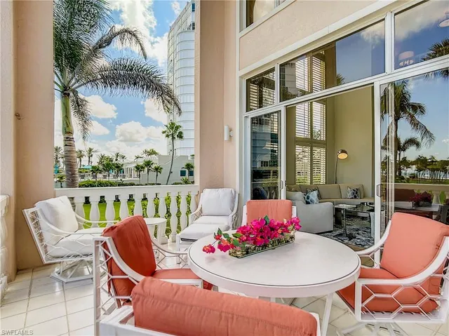 a outdoor dining space with furniture and outdoor view
