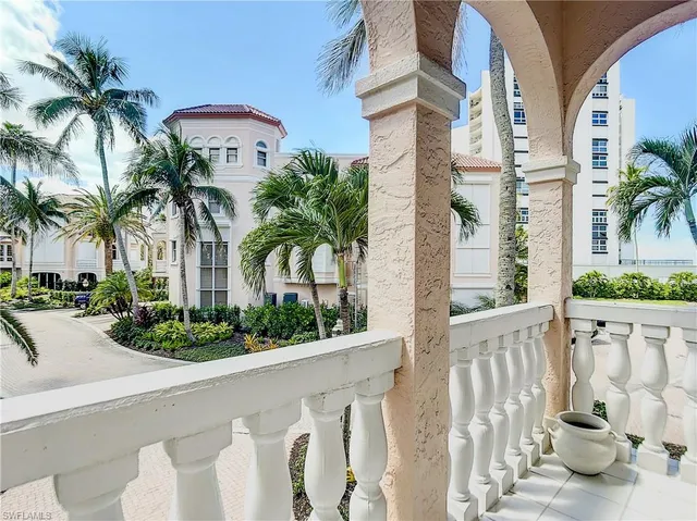 a kitchen with a sink and refrigerator