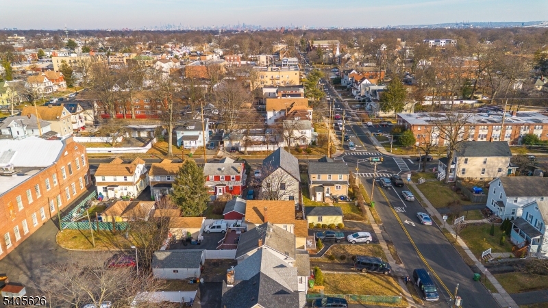 228 Locust Street Roselle, NJ 07203 - Photo 31 of 35 an aerial view of residential building and parking space