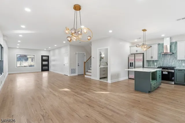 a bathroom with a sink a toilet and shower curtain