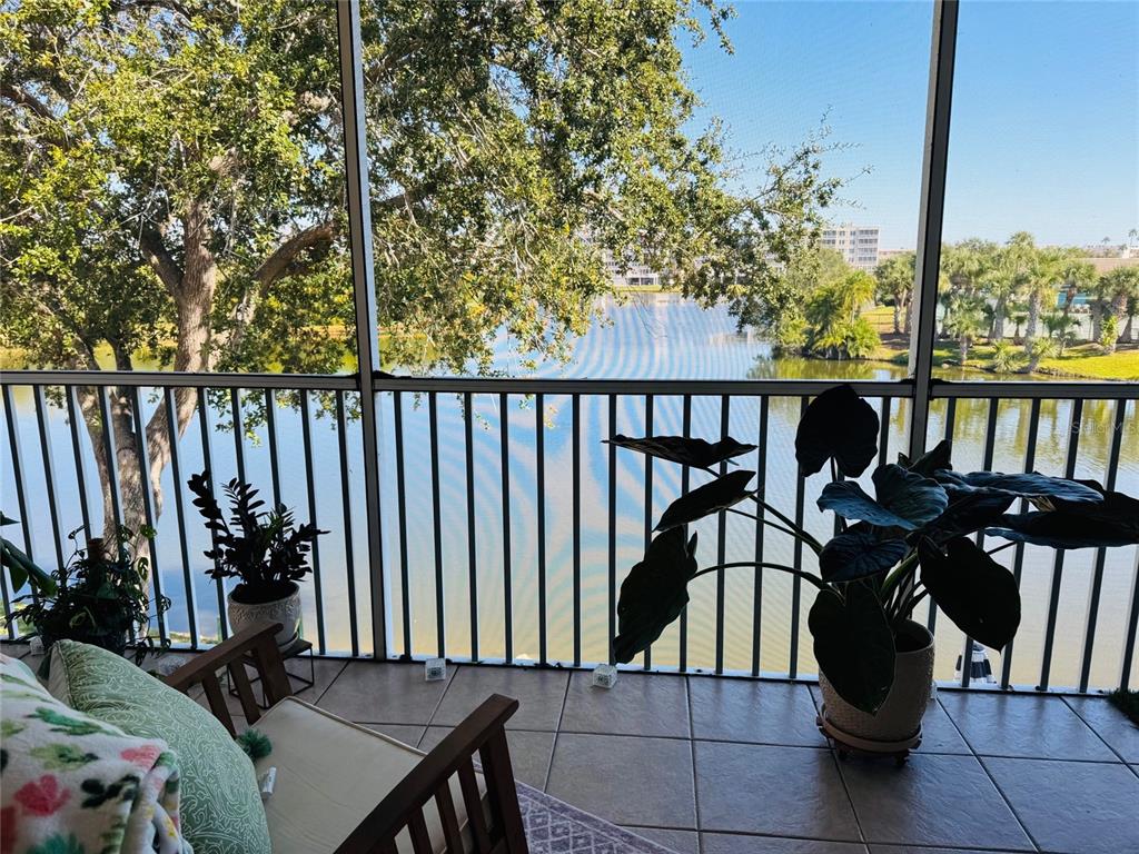 6311 99th Way North, Unit 11A St. Petersburg, FL 33708 - Photo 3 of 52 a view of balcony with furniture