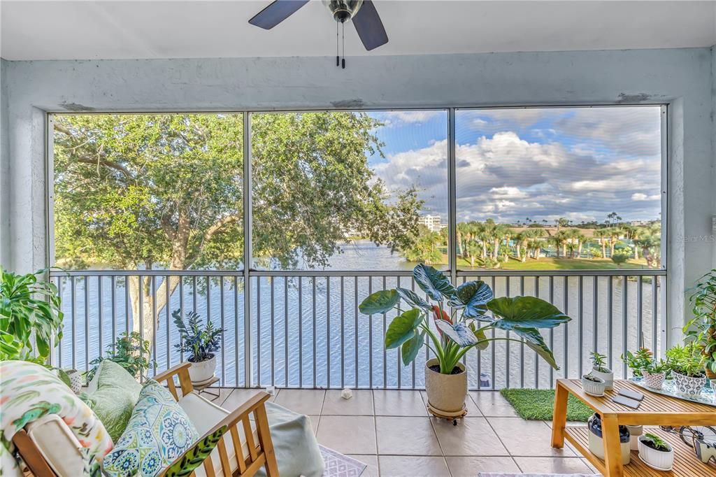 6311 99th Way North, Unit 11A St. Petersburg, FL 33708 - Photo 35 of 52 a view of a two chairs in the patio
