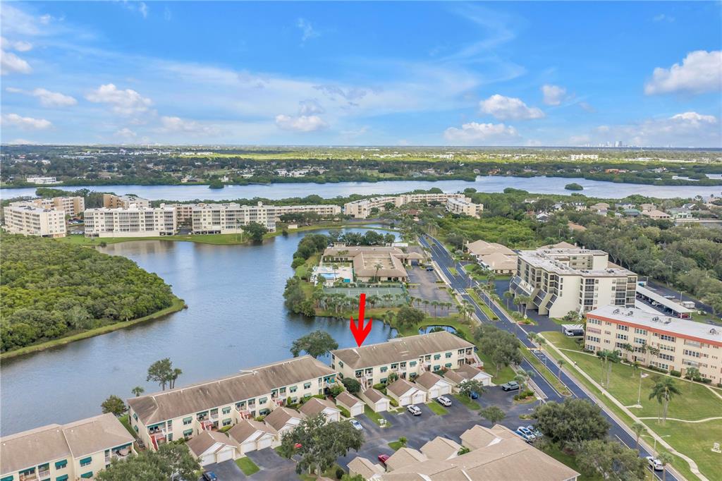 6311 99th Way North, Unit 11A St. Petersburg, FL 33708 - Photo 48 of 52 a view of a city and lake