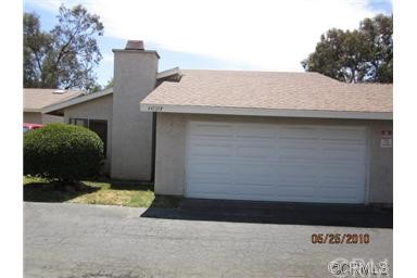 44737 F La Paz Road, Unit F Temecula, CA 92592 - Photo 1 of 1 Front of condo with two car garage, & newer garage door.