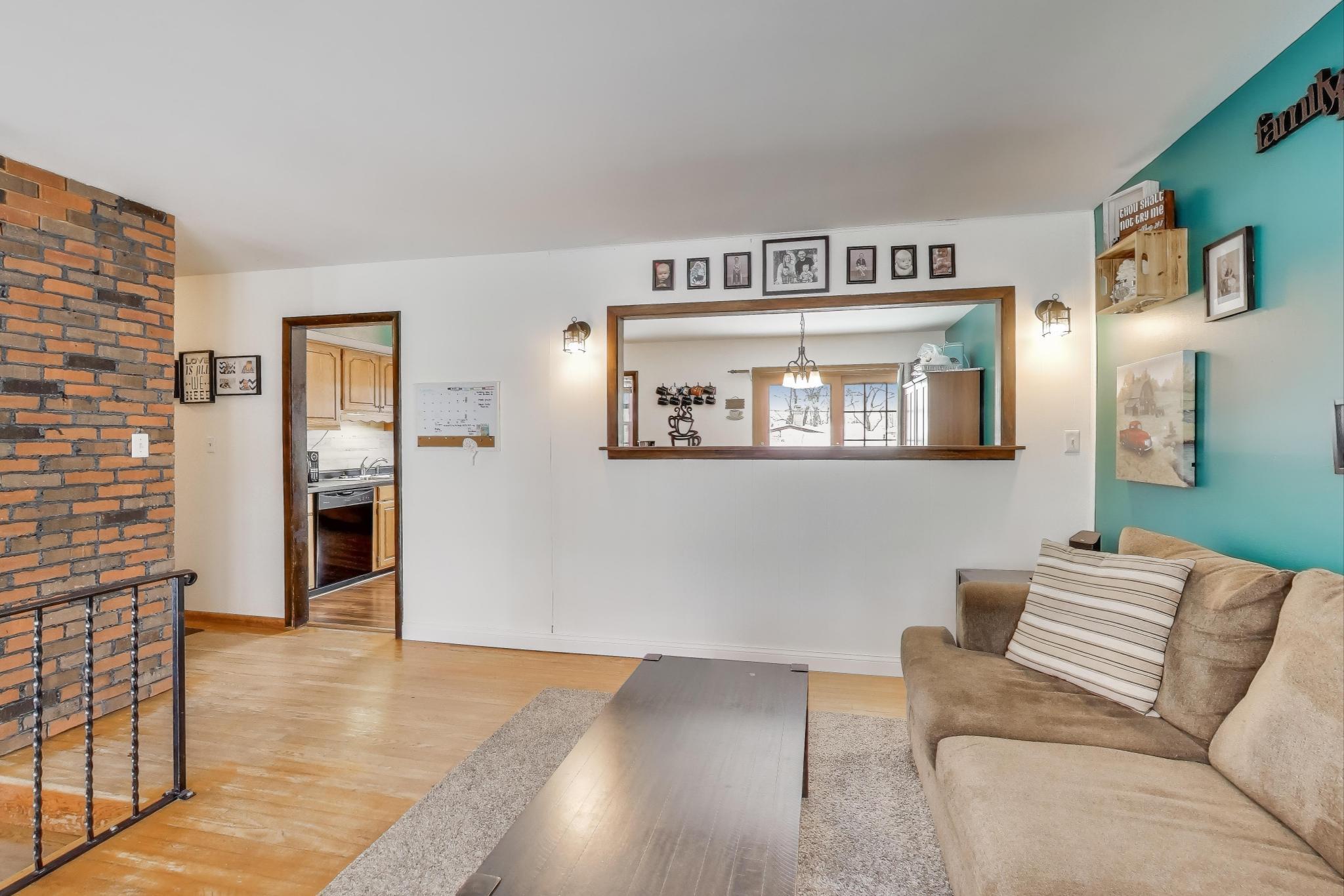 1044 North Rensselaer Street Griffith, IN 46319 - Photo 5 of 32 a living room with furniture and a window