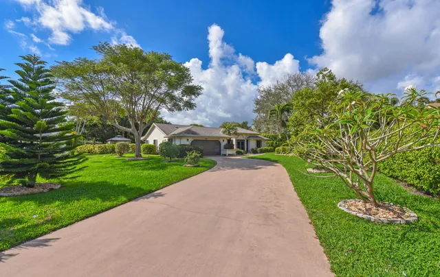 a view of a street with a building in the background