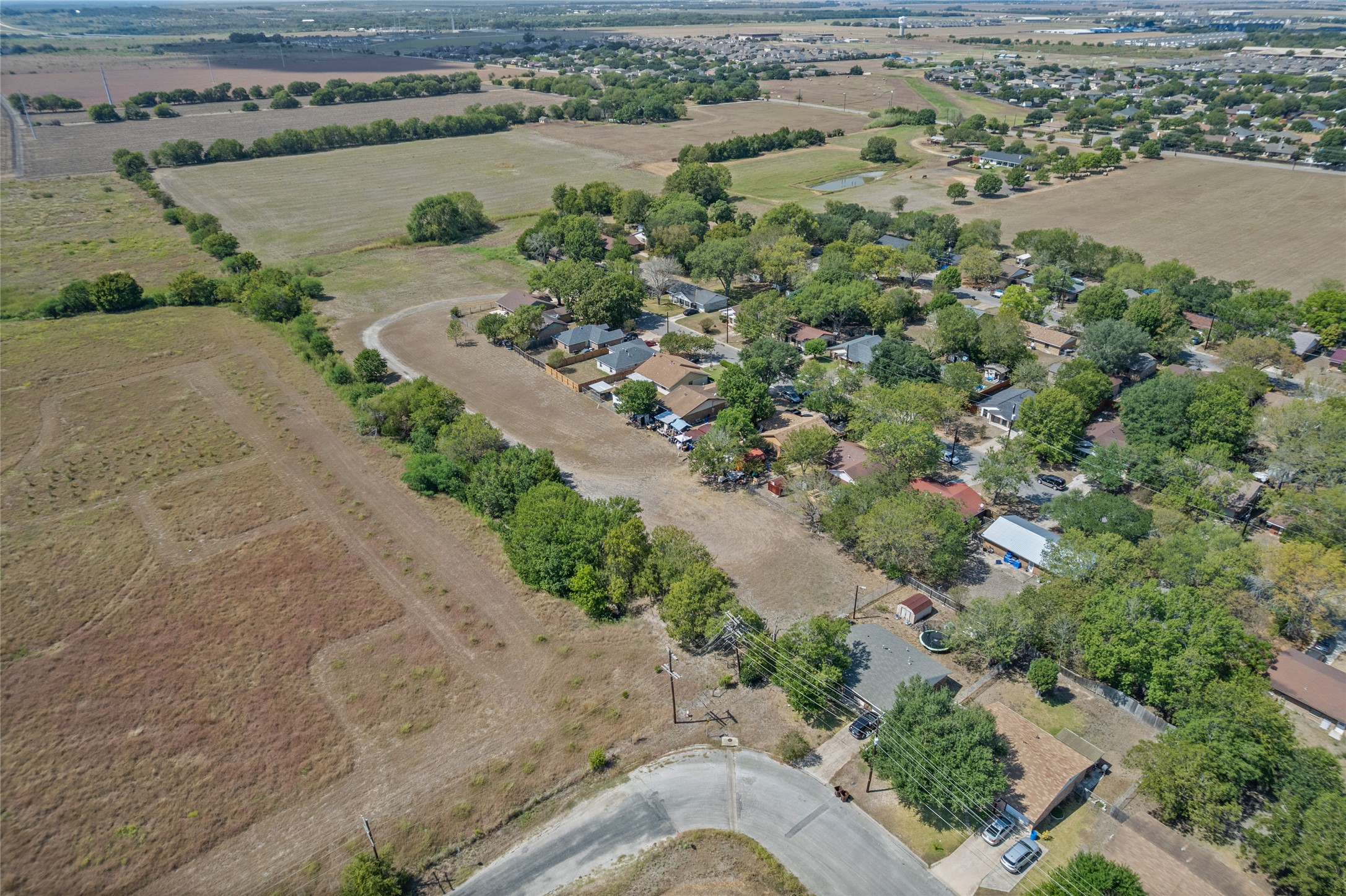 1508 Pendergrass Street Lockhart, TX 78644 - Photo 5 of 13 view of a lake with beach and outdoor space