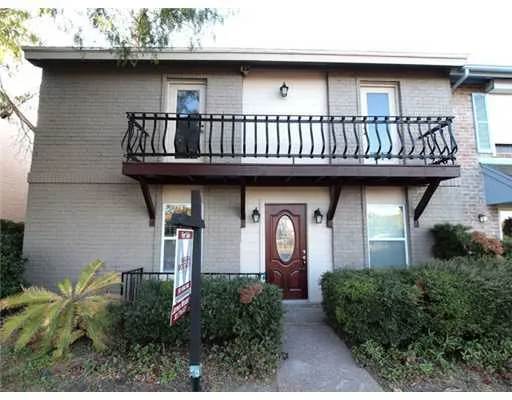 a front view of a house with balcony