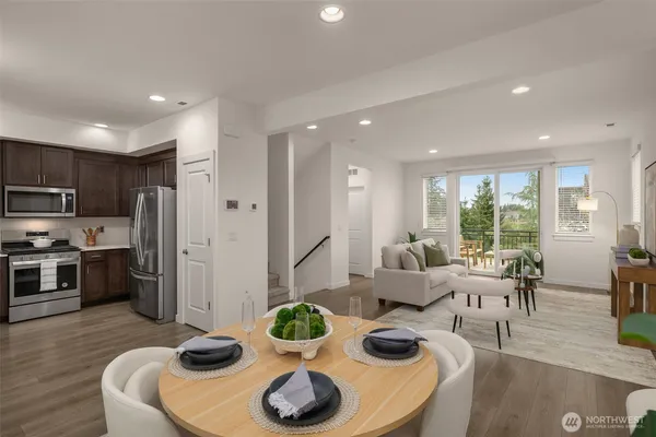 a kitchen with a sink stove and microwave