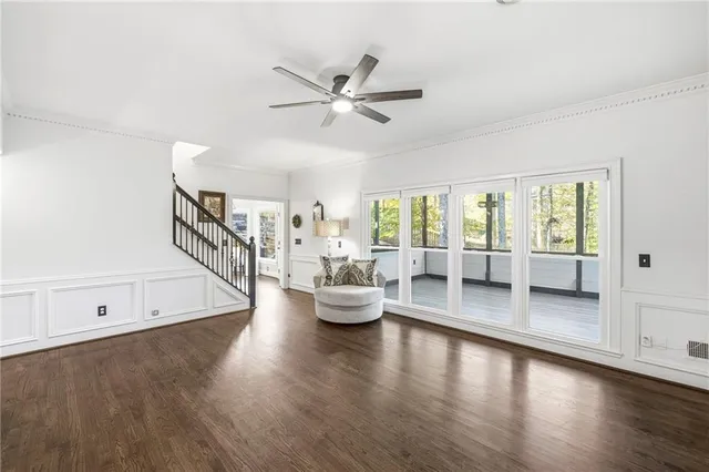 a view of a living room and hardwood floor