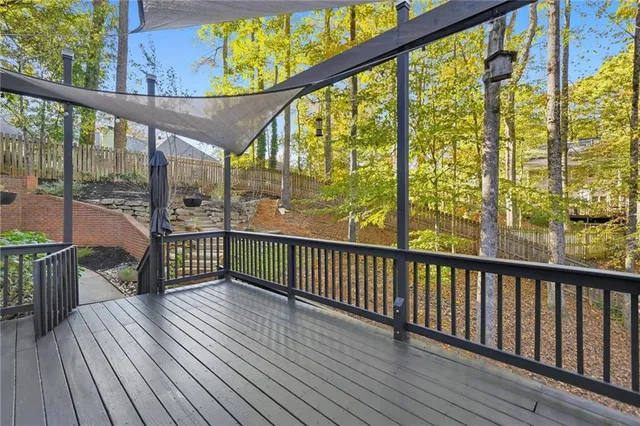 a view of a balcony with wooden floor