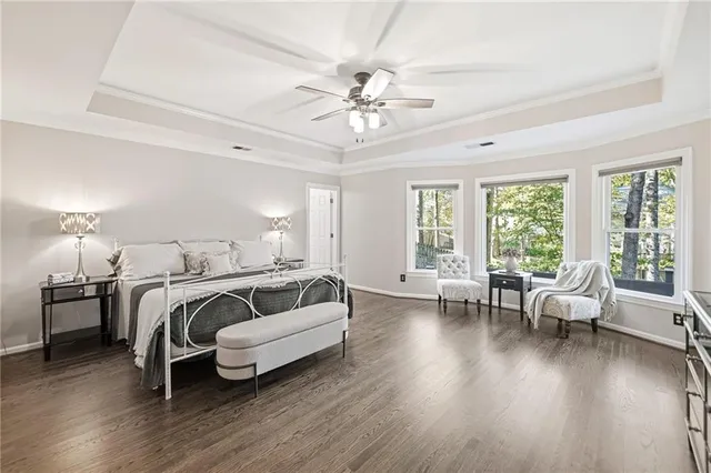 a bed room with furniture and a window