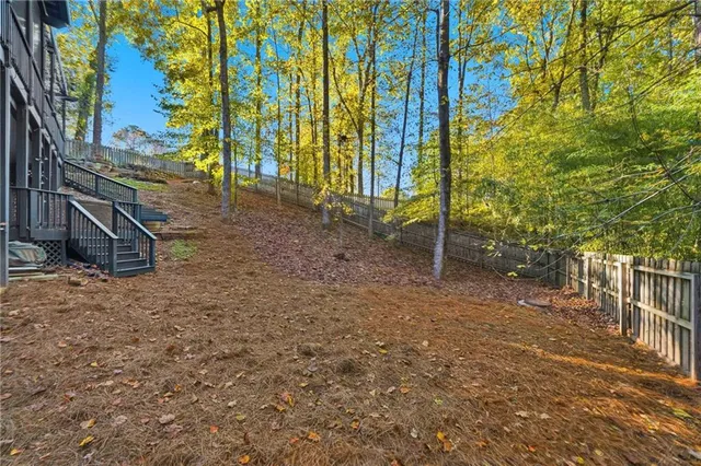 a view of a pathway with a yard