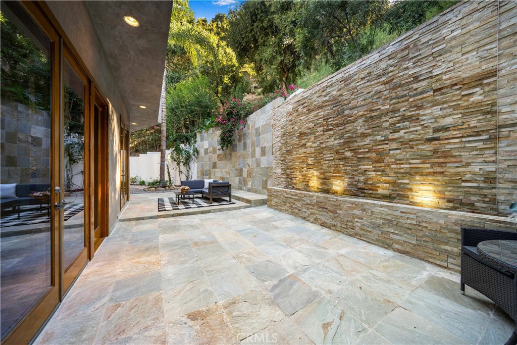 4104 Vanetta Place Studio City, CA 91604 - Photo 18 of 45 a view of backyard with swimming pool and seating space