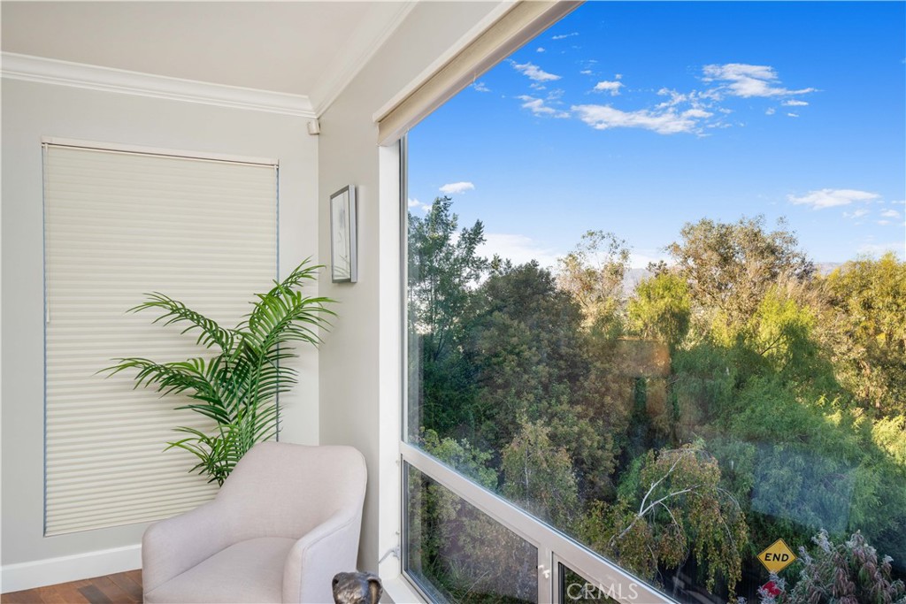 4104 Vanetta Place Studio City, CA 91604 - Photo 26 of 45 a view of a balcony with chair and table