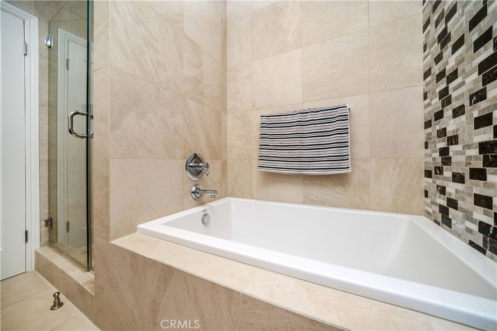 4104 Vanetta Place Studio City, CA 91604 - Photo 36 of 45 a bathroom with bathtub and a shower