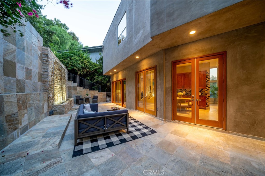 4104 Vanetta Place Studio City, CA 91604 - Photo 45 of 45 a patio with table and chairs and potted plants