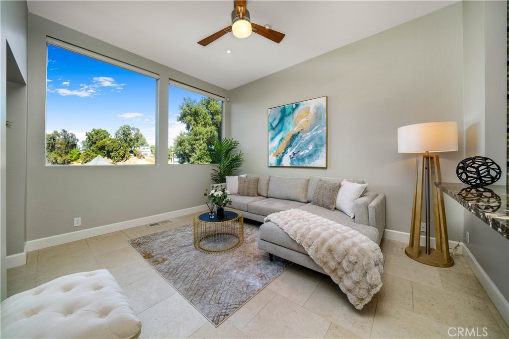 4104 Vanetta Place Studio City, CA 91604 - Photo 5 of 45 a living room with furniture and a window