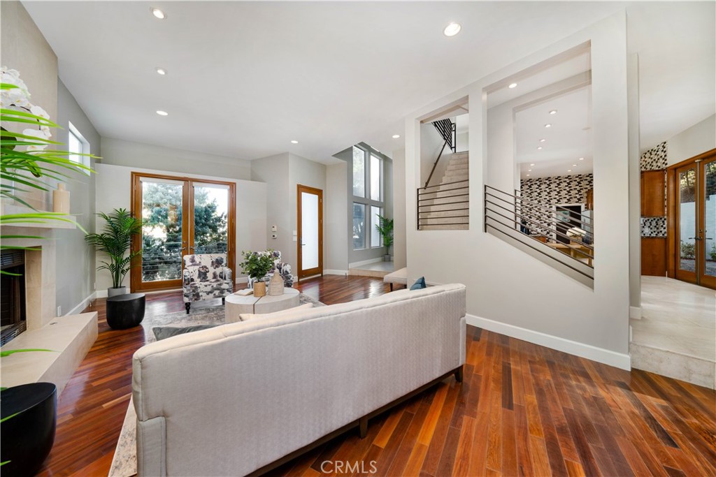 4104 Vanetta Place Studio City, CA 91604 - Photo 7 of 45 a living room with furniture and large windows