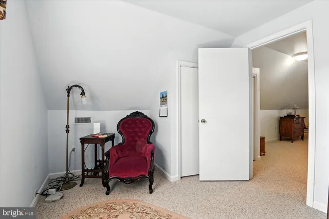 a room with furniture and a chair