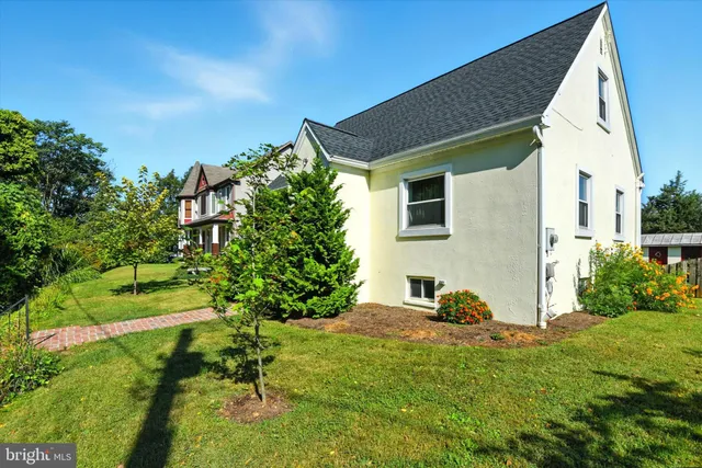 a backyard of a house with lots of green space
