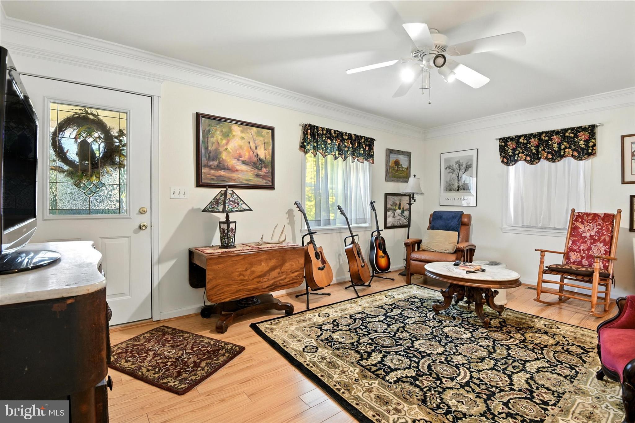 307 East Locust Street Union Bridge, MD 21791 - Photo 7 of 35 a living room with furniture and a rug