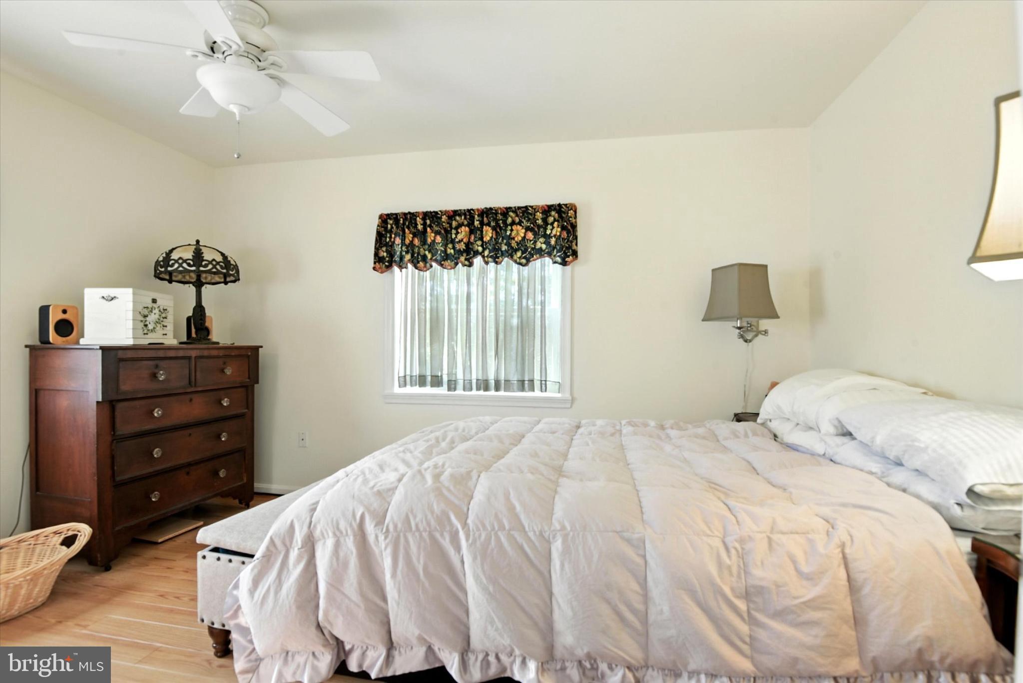 307 East Locust Street Union Bridge, MD 21791 - Photo 8 of 35 a bedroom with a bed and a window