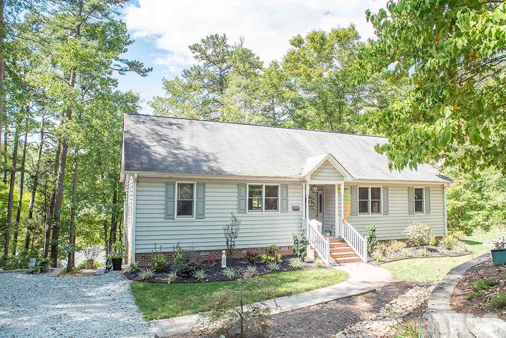 169 Willifords Point Road Roxboro, NC 27574 - Photo 30 of 30 a house view with a garden space