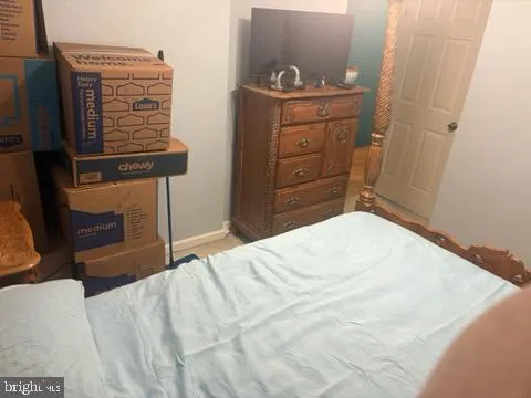 a bedroom with a bed and furniture
