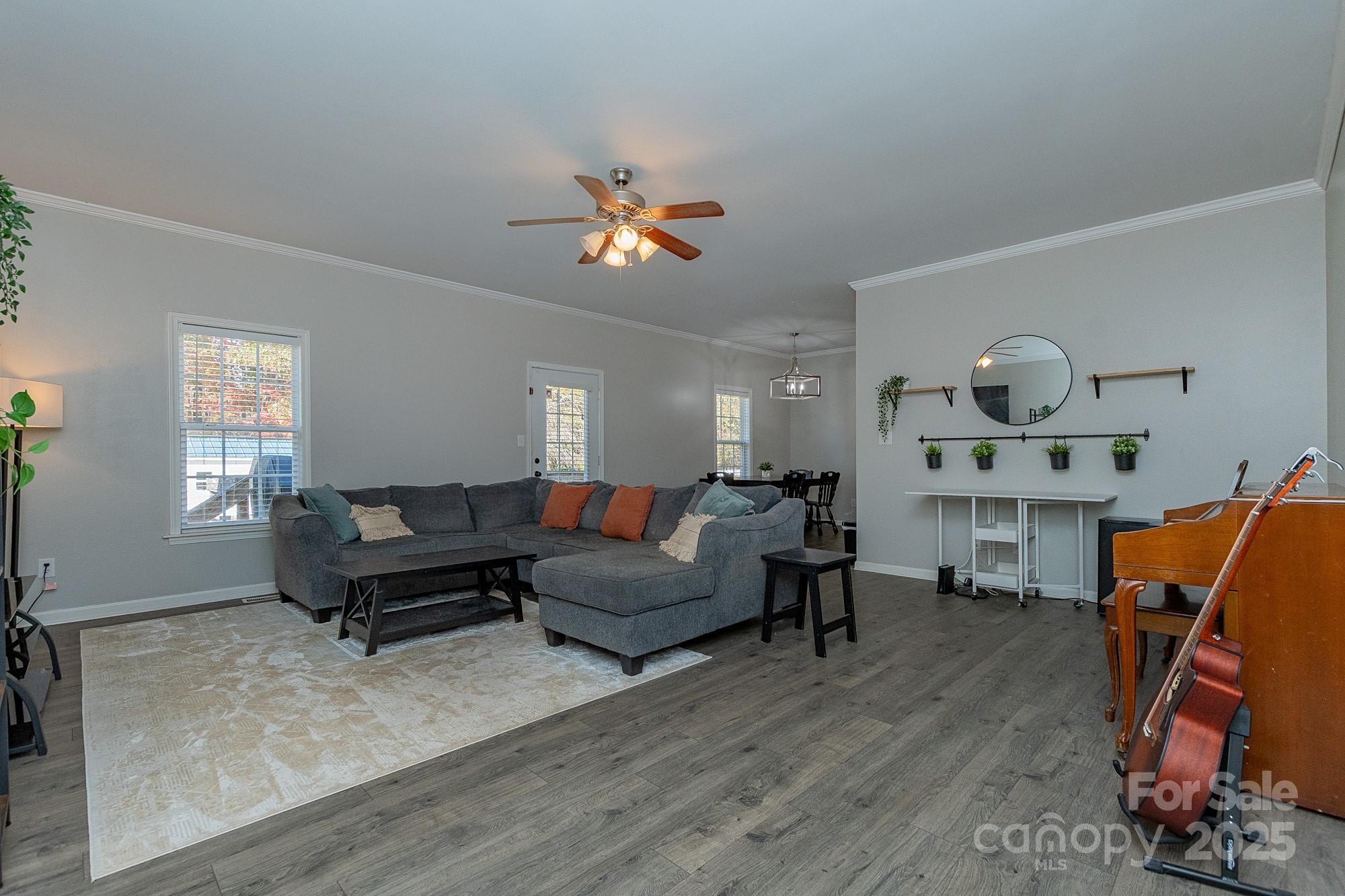 174 Isaiah Court Lexington, NC 27292 - Photo 3 of 37 a living room with furniture a rug and a window