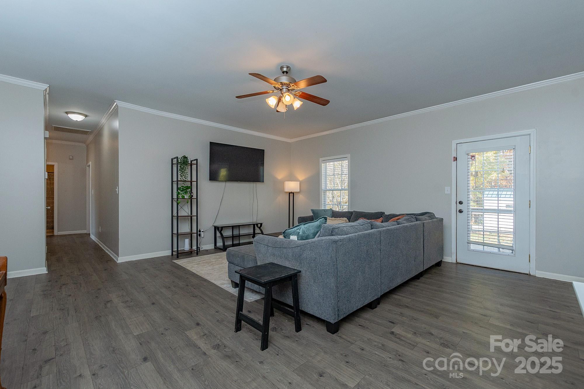174 Isaiah Court Lexington, NC 27292 - Photo 5 of 37 a living room with furniture and a wooden floor