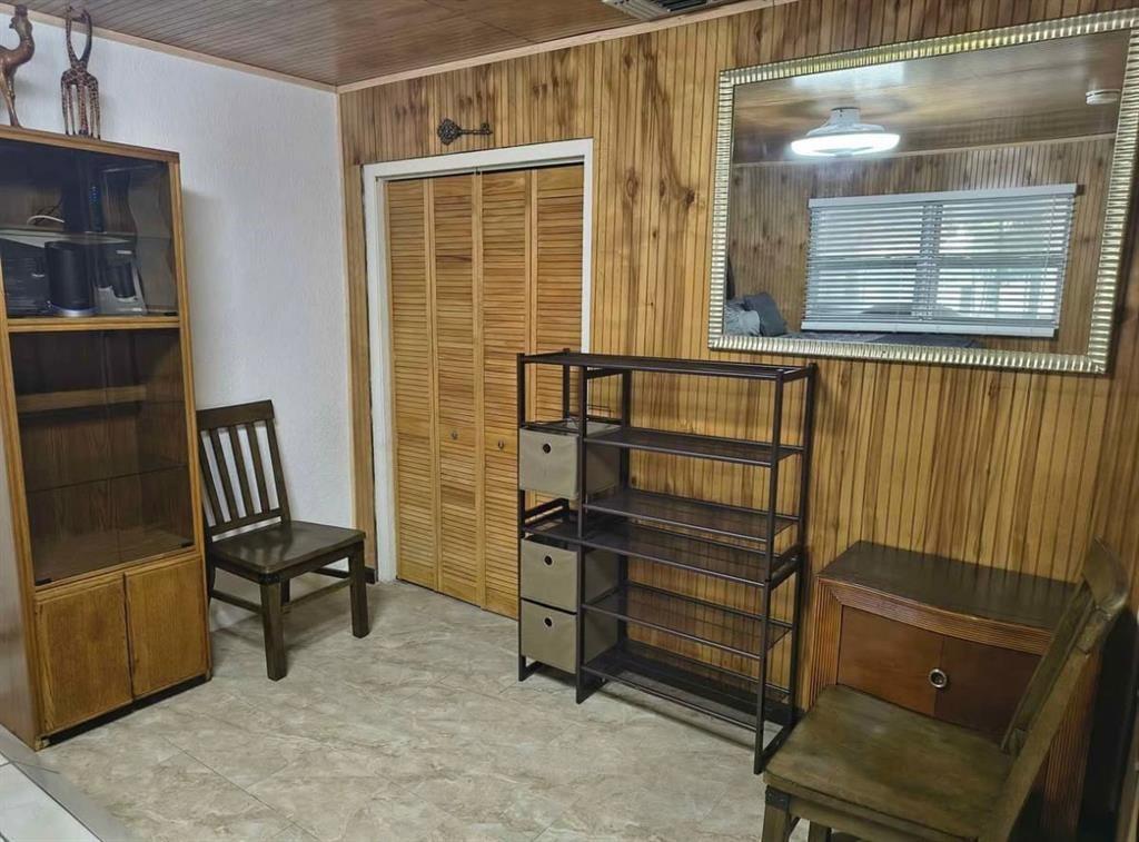 5741 Southwest 24th Avenue, Unit A Fort Lauderdale, FL 33312 - Photo 11 of 14 a view of chairs in the room