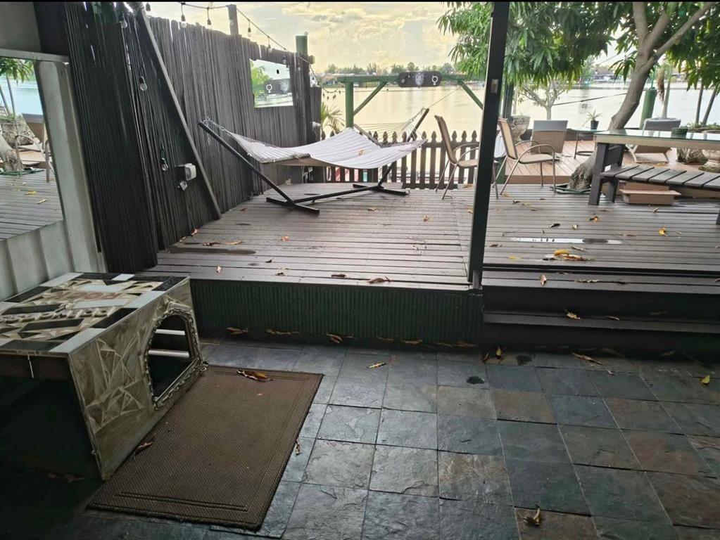 5741 Southwest 24th Avenue, Unit A Fort Lauderdale, FL 33312 - Photo 14 of 14 a view of outdoor space stove and kitchen view