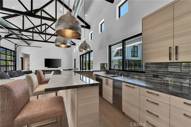 a living room with furniture and flat screen tv