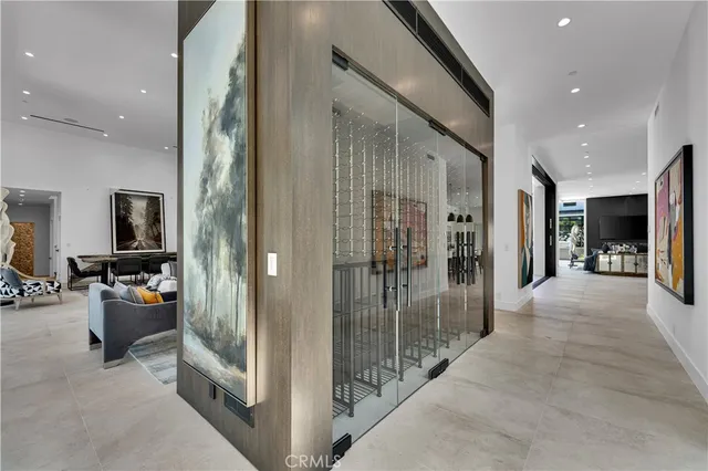 a view of a hallway with living room