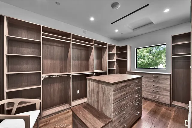 a kitchen with a stove and a refrigerator
