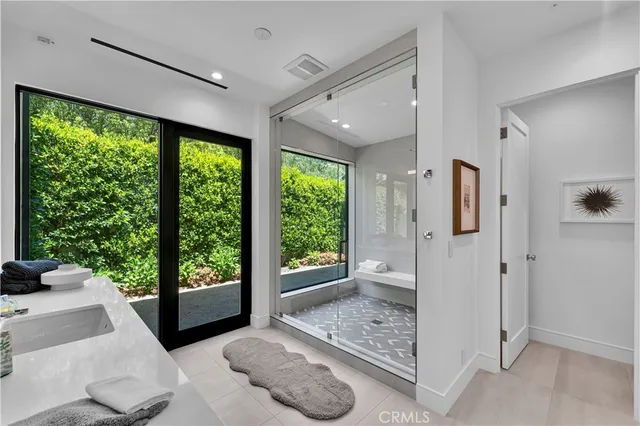 a view of livingroom with furniture and front door