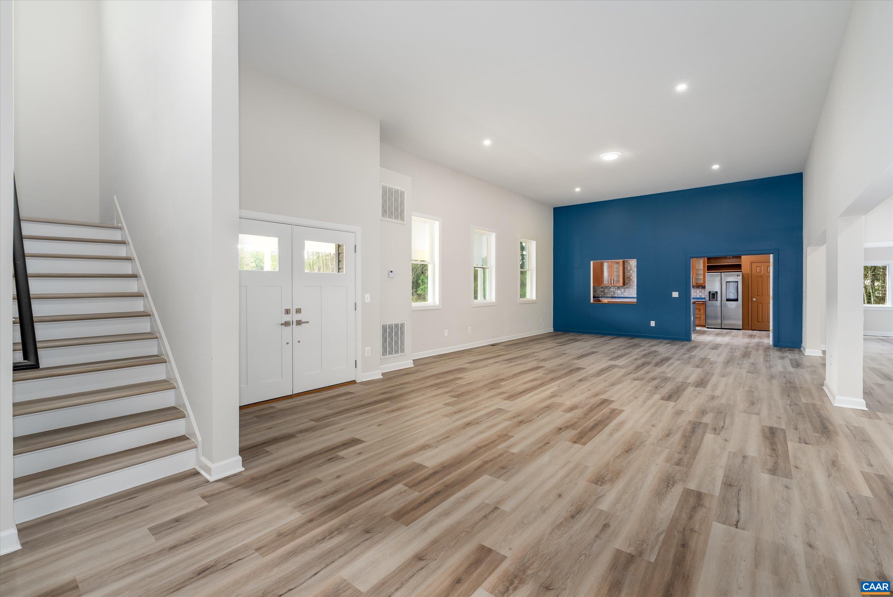 2301 Johnson Road Mineral, VA 23117 - Photo 12 of 37 an empty room with wooden floor and windows