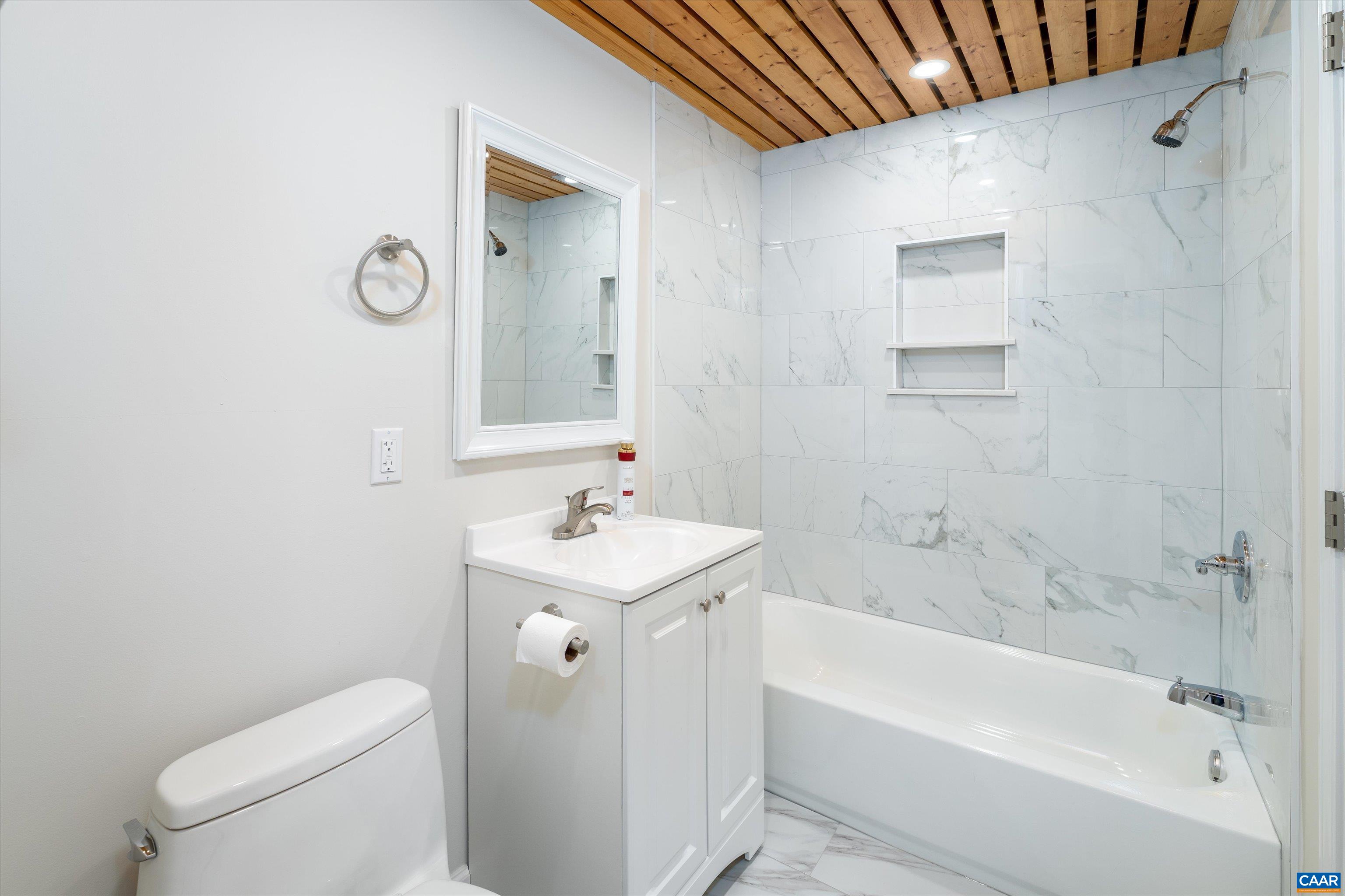 2301 Johnson Road Mineral, VA 23117 - Photo 20 of 37 a bathroom with a sink a toilet and shower