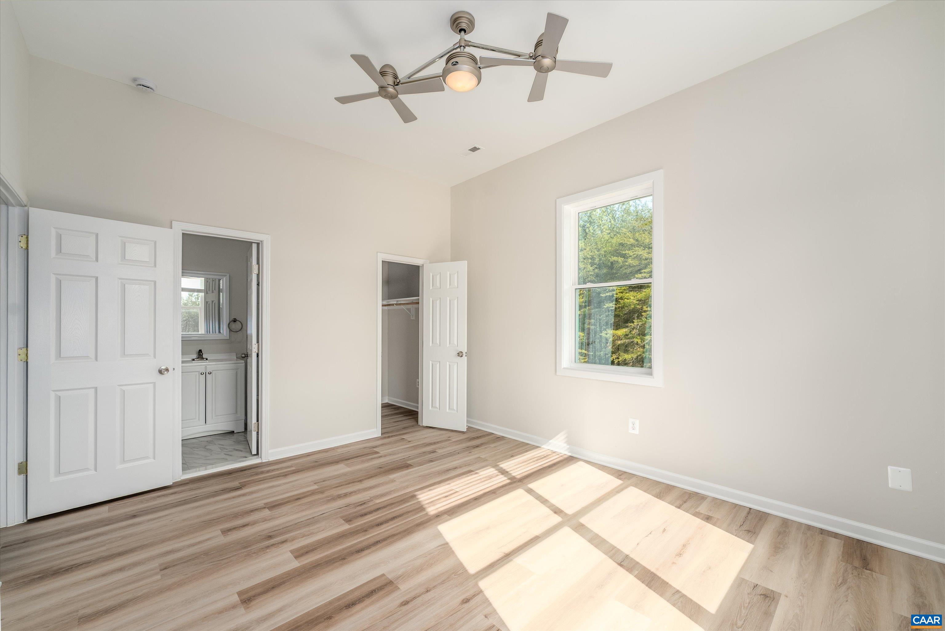 2301 Johnson Road Mineral, VA 23117 - Photo 37 of 37 a view of empty room with wooden floor and fan