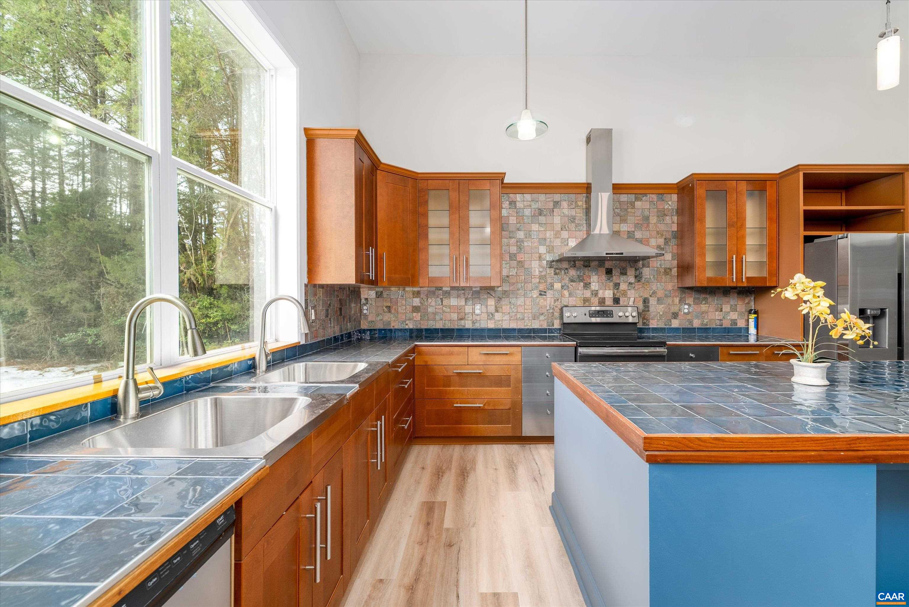 2301 Johnson Road Mineral, VA 23117 - Photo 4 of 37 a kitchen with large windows and a sink