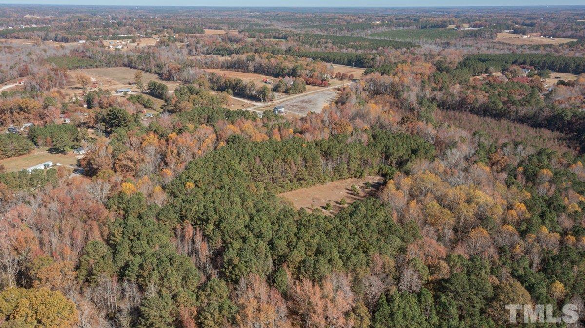 0 Davis Road Zebulon, NC 27597 - Photo 2 of 5 an aerial view of house with yard and mountain view